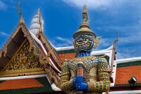 Photo for Giant statue in the Temple of the Emerald Buddha at Grand palace in Thailand. - Royalty Free Image