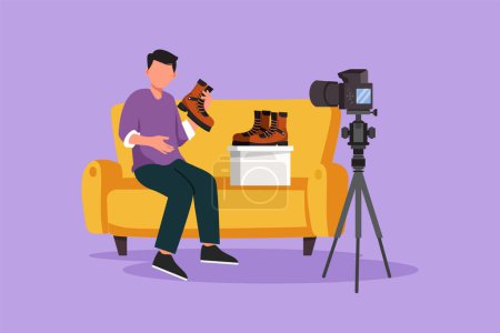 Illustration for Graphic flat design drawing social media influencer reviewing boots. Smiling young man vlogging about men's sports shoe and filming himself at home on a video camera. Cartoon style vector illustration - Royalty Free Image