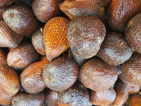 Photo for Bulk of salacca fruits or snake fruits in traditional market. - Royalty Free Image