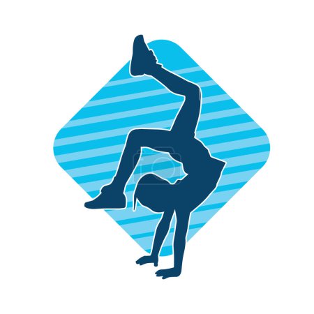Silhouette of a female teenage girl dancing and doing handstand pose 