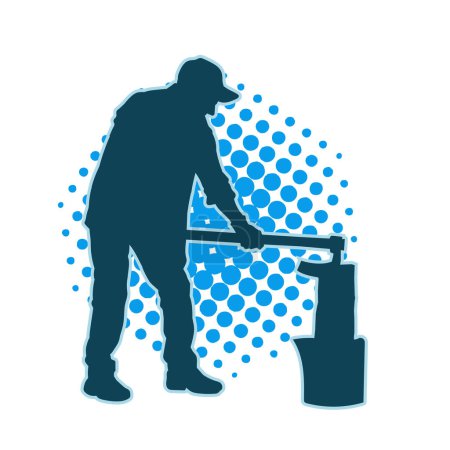Silhouette of a male worker chopping wood using long shaft axe tool