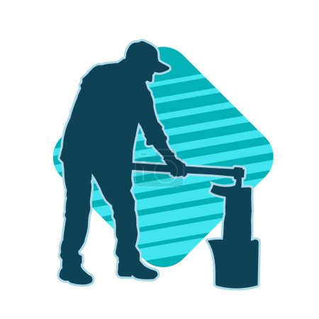 Silhouette of a male worker chopping wood using long shaft axe tool