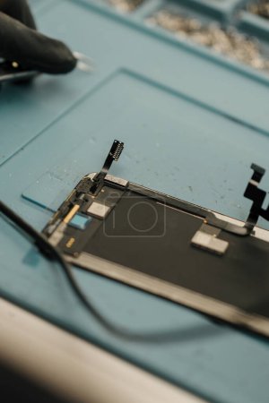Photo for Macro shot - phone being repaired by an engineer - Royalty Free Image