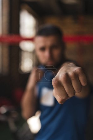 Photo for Close up of a boxer's fist in gym punch - Royalty Free Image