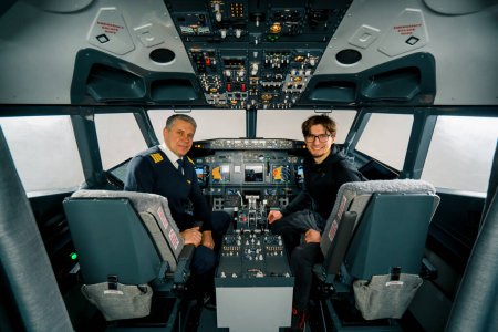 Photo for Airplane cockpit pilot and young student boy smiling after training flight simulator entertainment concept - Royalty Free Image