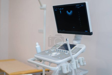 Photo for Medical office with ultrasound diagnostic equipment in health clinic gynecological office - Royalty Free Image