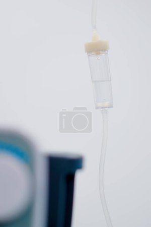 Photo for Intravenous saline bag in the operating room before the start of a surgical procedure in medical clinic - Royalty Free Image