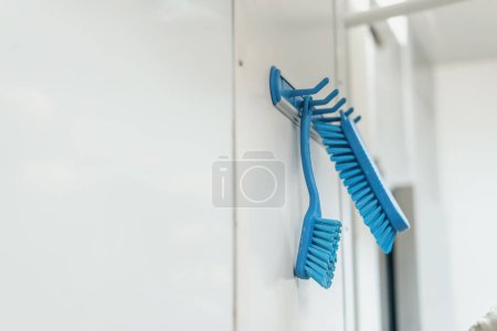 Photo for Professional working tools cleaning cheese in production brush close-up - Royalty Free Image