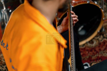Photo for Rock performer with electric guitar in recording studio recording playing own track creating song musical instrument strings closeup - Royalty Free Image