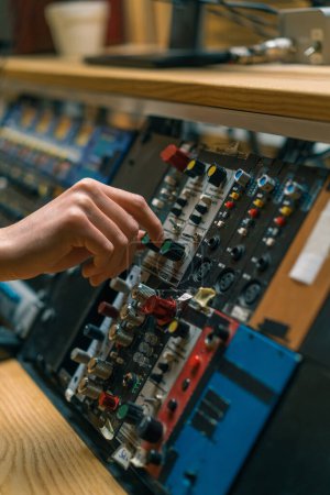 Photo for Sound Engineer Using Digital Audio Mixer Sliders Engineer Pressing Keys Control Panel Recording Studio Technician Closeup - Royalty Free Image