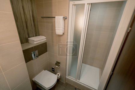Photo for Interior of a luxury hotel room after cleaning housekeeping bathroom concept cleanliness and hospitality travel recreation - Royalty Free Image