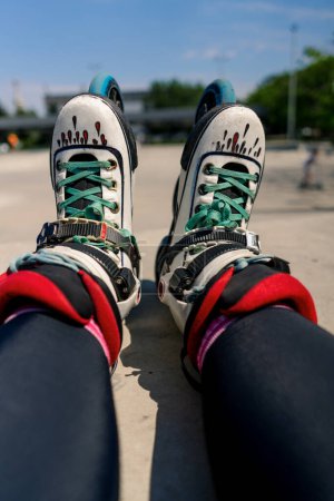 Photo for Close-up of roller skates on the background of a skate park a street athlete rests after competition - Royalty Free Image