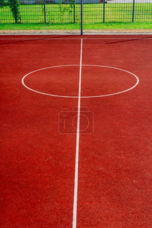 Photo for Close-up of the dirt court basketball court at the park concept of the love of the game of basketball - Royalty Free Image