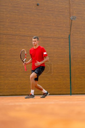 Photo for Portrait of a young professional tennis player rejoices at the victory at the tournament competition on open court winner sport game - Royalty Free Image