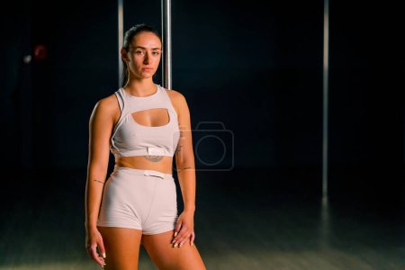 Photo for Portrait young beautiful sexy girl after pole dancing class active lifestyle hobby - Royalty Free Image