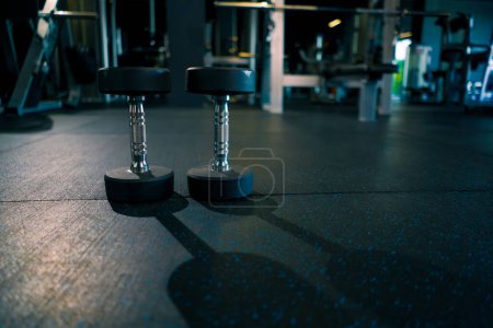 Photo for Sports equipment in the gym heavy dumbbells active sports professional training closeup - Royalty Free Image