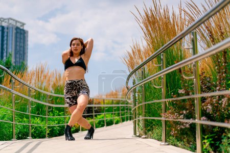 Photo for Street dancing Sexy young fit woman in heels dancing heels on the street in city hobby active lifestyle seduction - Royalty Free Image