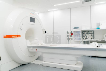 Photo for A shot of a computed tomography machine located in medical center for a diagnosing the health of patients - Royalty Free Image