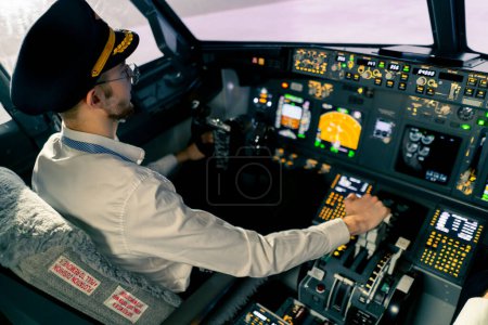 Photo for Airplane pilot controls throttle during flight or takeoff Cockpit view air traffic control - Royalty Free Image