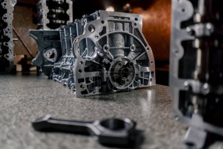 Photo for Top shot Disassembled engine block is on the table the mechanic opened the locking valve mechanism Motor capital repair - Royalty Free Image