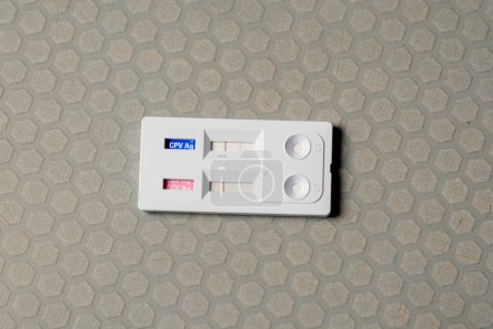 Photo for Close-up in a veterinary clinic there is a used infection test on the table - Royalty Free Image