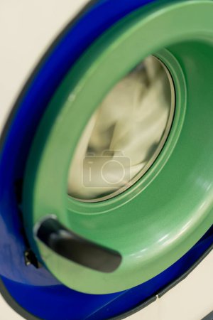 Téléchargez les photos : Close up professional dry cleaning washing machine washing process on professional delicate equipment - en image libre de droit