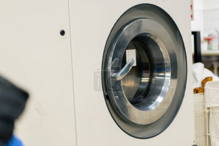 Photo for Close up professional dry cleaning washing machine washing process on professional delicate equipment - Royalty Free Image