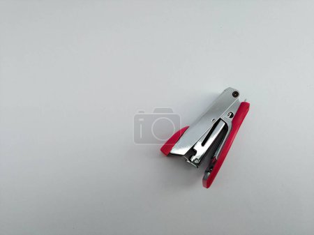 Photo for Pink staples on white background - Royalty Free Image