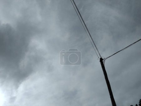 Photo for Internet cable pole with sky background - Royalty Free Image