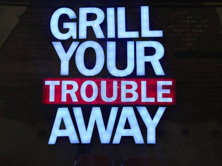 A post about grilling meat "Grill Your Trouble Away"