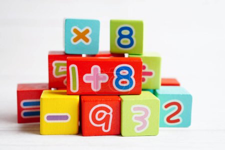 Number wood block cubes for learning Mathematic, education math concept. Poster 619298846