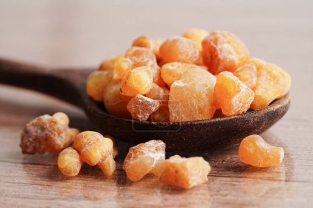 Photo for Frankincense or olibanum aromatic resin used in incense and perfumes. - Royalty Free Image