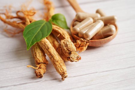 Ginseng roots and green leaf, healthy food.