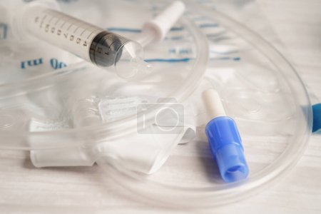Photo for Foley catheter and urine drainage bag collect urine for disability or patient in hospital. - Royalty Free Image
