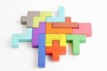 Logical thinking and problem solving problem solution creative business concept, wooden puzzle geometric block shape. 