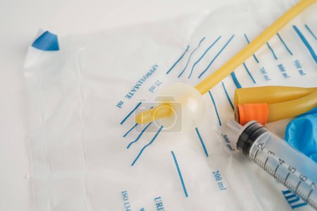 Foley catheter and urine drainage bag collect urine for disability or patient in hospital.
