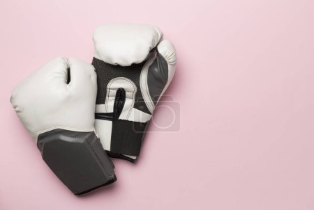 Photo for Martial arts gloves on color background, top view - Royalty Free Image