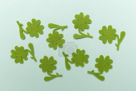Photo for Felt clover on color background, top view. St. Patricks day concept - Royalty Free Image