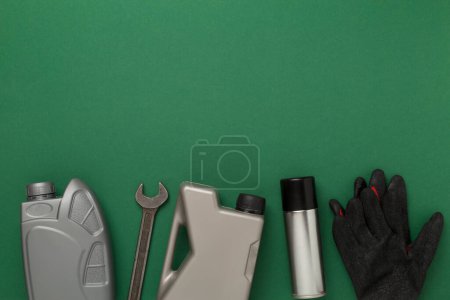 Car tools and accessories on color background, top view