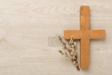 Photo for Cross and palm on wooden white background easter sign symbol concept - Royalty Free Image