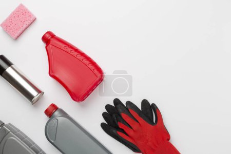 Car tools and accessories on color background, top view