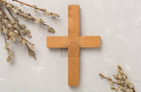 Photo for Cross with willow branches on concrete background, top, view. Palm Sunday concept - Royalty Free Image