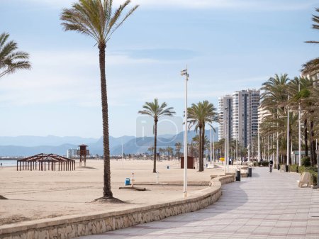 Photo for Cullera, Spain; March 4th 2024: Cullera town Sant Antoni promenade and beach in the coast of Valencia - Royalty Free Image