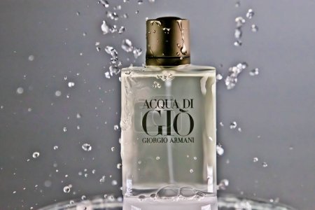 Téléchargez les photos : ACQUA DI GIO by Giorgio Armani, perfume bottle with water splash - en image libre de droit