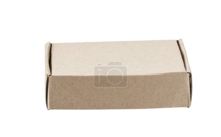 Téléchargez les photos : Cardboard box for delivery service, moving, package or gifts isolated on a white background. closed cardboard box isolated. Packaging box and shipping online cardbox isolated - en image libre de droit