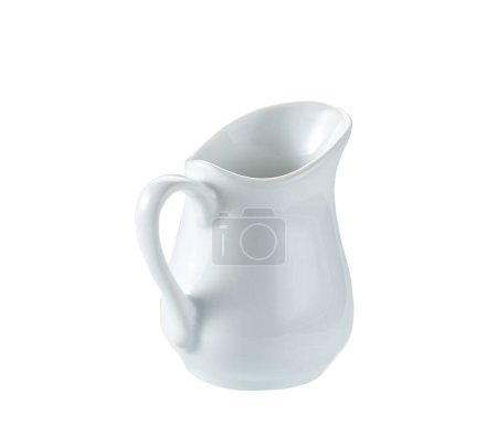 Foto de Ceramic milk jar isolated on white background. Porcelain creamer pitcher with milk on white. - Imagen libre de derechos