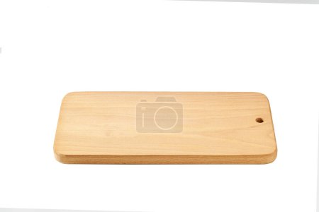 Foto de Chopping board isolated on white background with clipping path. Cutting board made of natural wood. - Imagen libre de derechos