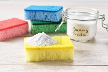 Photo for House care natural healthy cleaning with baking soda on a white wooden table. - Royalty Free Image