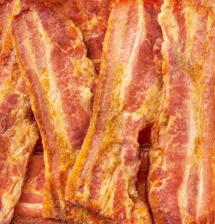 Photo for Background texture of fried bacon rashers . - Royalty Free Image