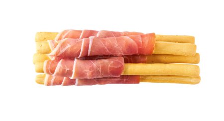 Photo for Italian stick bread grissini with parma ham prosciutto, traditional breadsticks with prosciutto isolated on white background full depth of field top view. - Royalty Free Image
